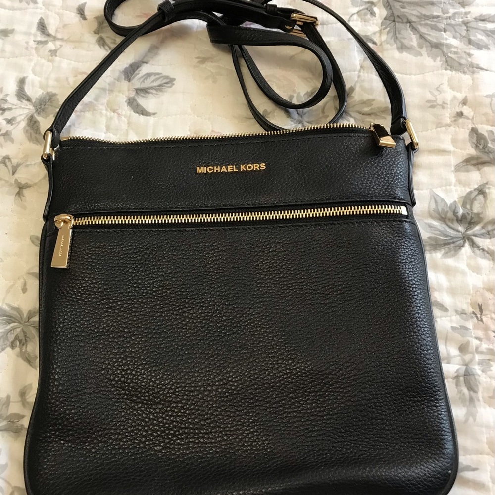 Michael Korrs black crossbody purse